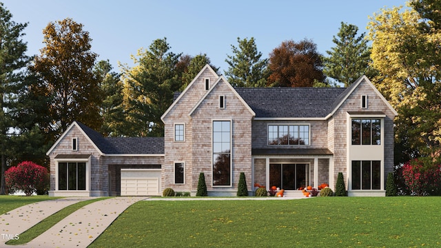 view of front facade with a garage and a front yard