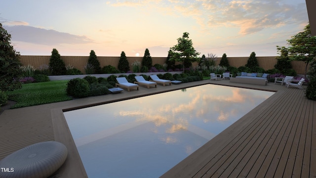 view of swimming pool featuring a fenced in pool, a deck, and a fenced backyard