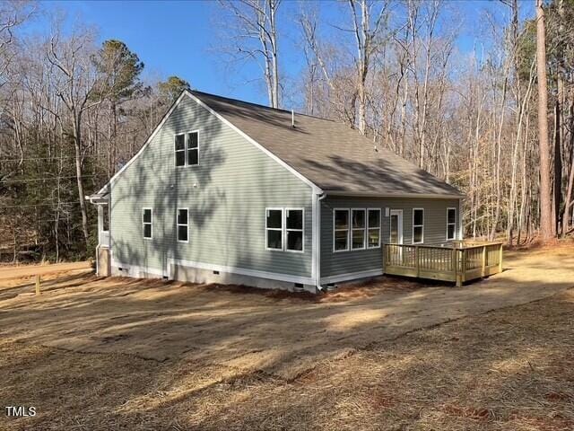 exterior space featuring a wooden deck