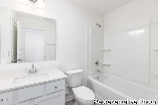 full bathroom featuring vanity, toilet, and washtub / shower combination