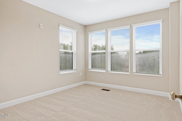 view of carpeted spare room