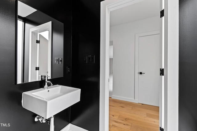 bathroom featuring hardwood / wood-style floors and sink