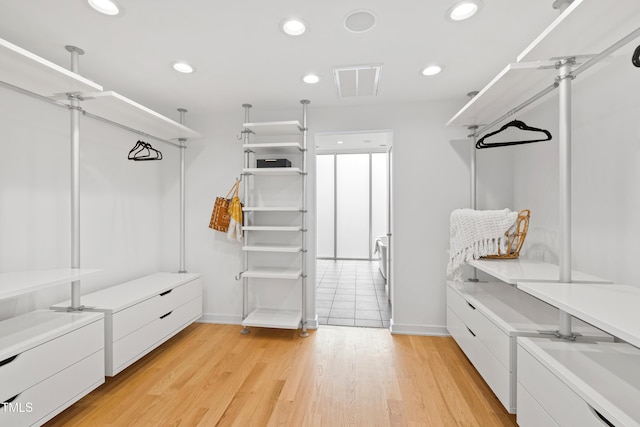 mudroom with light wood-type flooring