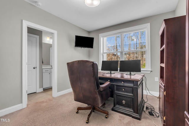 office area with baseboards and light colored carpet