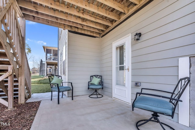 view of patio featuring stairs