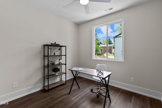 office with dark hardwood / wood-style flooring and ceiling fan