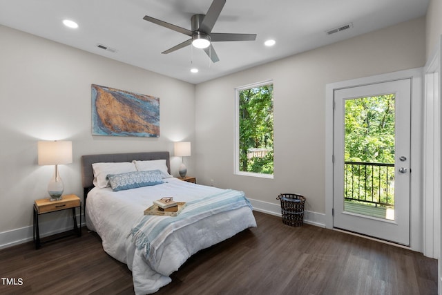 bedroom featuring ceiling fan, dark hardwood / wood-style floors, and access to outside