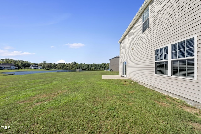 view of yard with a water view