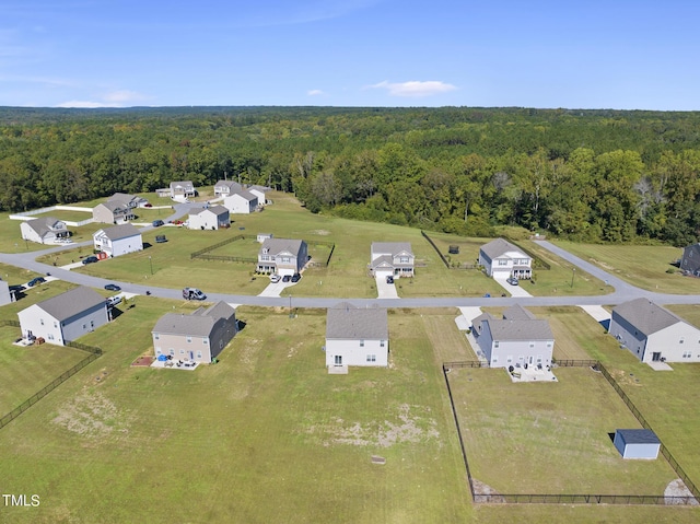 aerial view with a wooded view