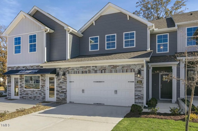 view of front of property with a garage