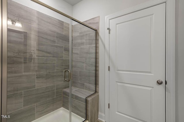 bathroom with an enclosed shower