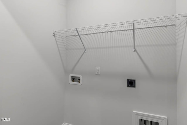 laundry area with hookup for a washing machine and electric dryer hookup