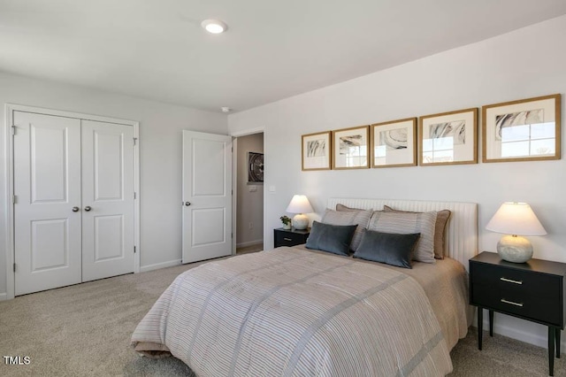 carpeted bedroom featuring a closet