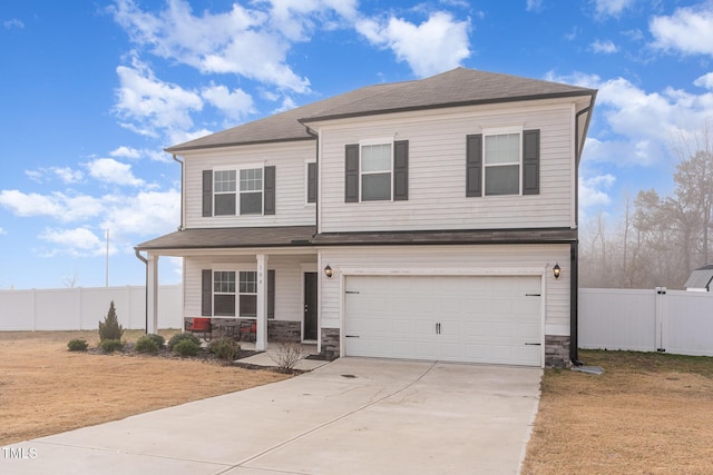 view of front of property with a garage