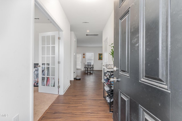 entryway featuring dark wood-type flooring