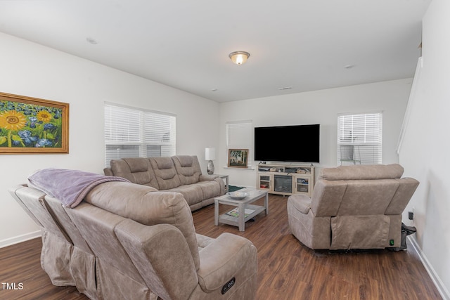 living room featuring dark hardwood / wood-style floors