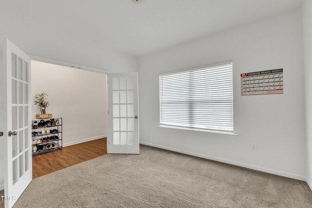 108 Bonnie Girl Ct, Lillington, NC 27546 - unfurnished room with carpet flooring, french doors, and baseboards