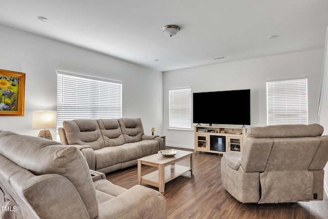 108 Bonnie Girl Ct, Lillington, NC 27546 - living area featuring baseboards and dark wood-style floors