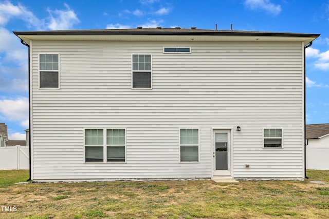 108 Bonnie Girl Ct, Lillington, NC 27546 - back of house featuring fence and a lawn