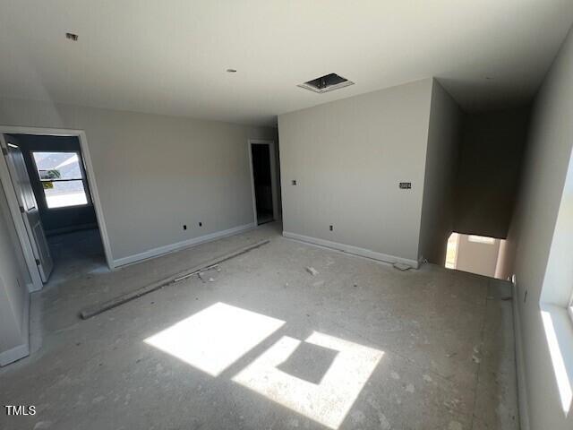 unfurnished bedroom with baseboards