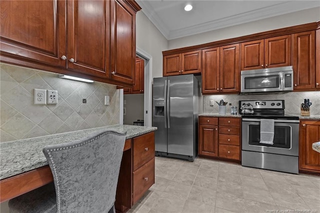 kitchen featuring light tile patterned floors, appliances with stainless steel finishes, light stone countertops, ornamental molding, and decorative backsplash