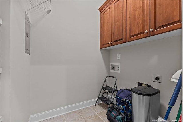 clothes washing area featuring cabinets, hookup for an electric dryer, washer hookup, and light tile patterned floors