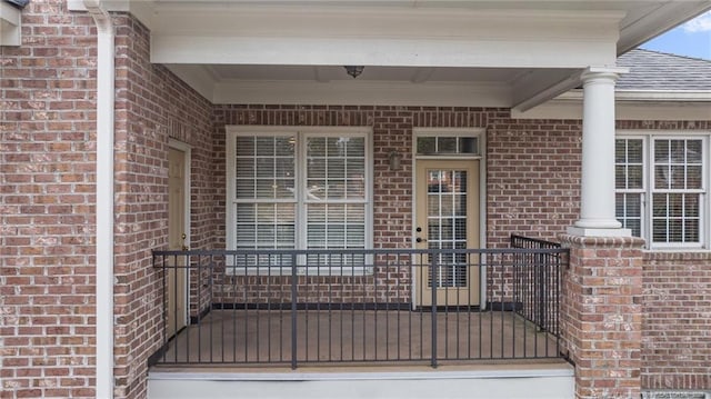 property entrance featuring covered porch