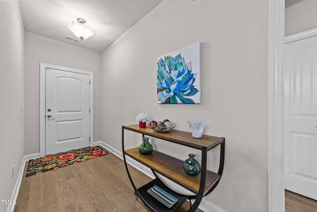 2001 Bunnfield Dr, Zebulon, NC 27597 - foyer entrance with wood finished floors and baseboards