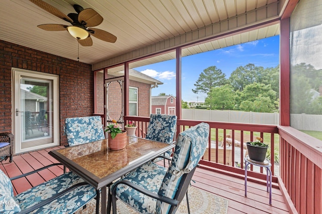 2001 Bunnfield Dr, Zebulon, NC 27597 - sunroom with ceiling fan and outdoor dining space