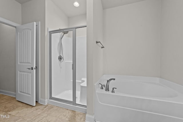 2001 Bunnfield Dr, Zebulon, NC 27597 - full bath with a shower stall and a bath