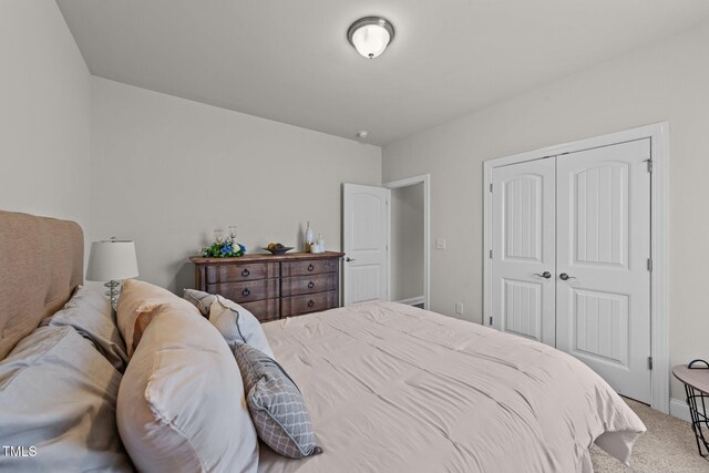 2001 Bunnfield Dr, Zebulon, NC 27597 - bedroom featuring carpet floors and a closet