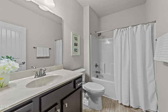 2001 Bunnfield Dr, Zebulon, NC 27597 - full bathroom featuring vanity, wood finished floors, and shower / tub combo with curtain