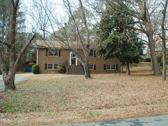 view of front of property with a carport