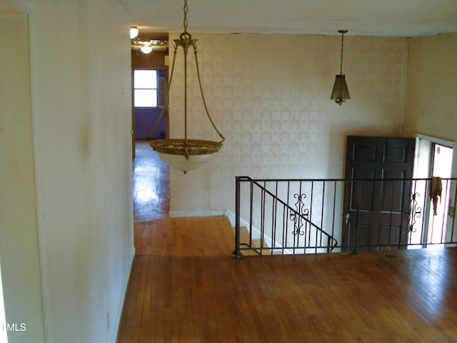 hallway featuring wood-type flooring