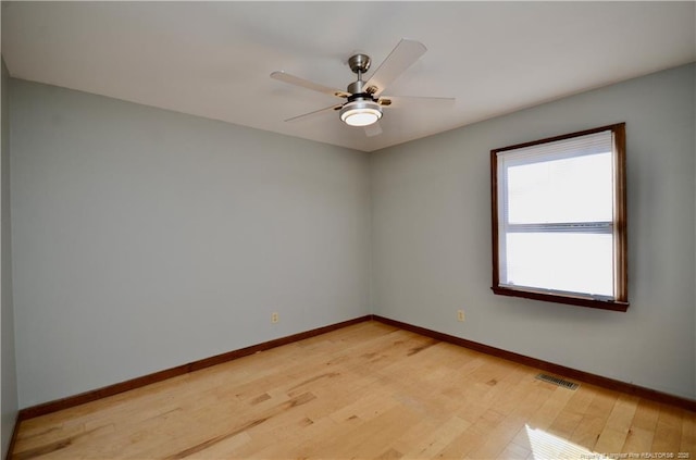 unfurnished room featuring ceiling fan and light hardwood / wood-style floors