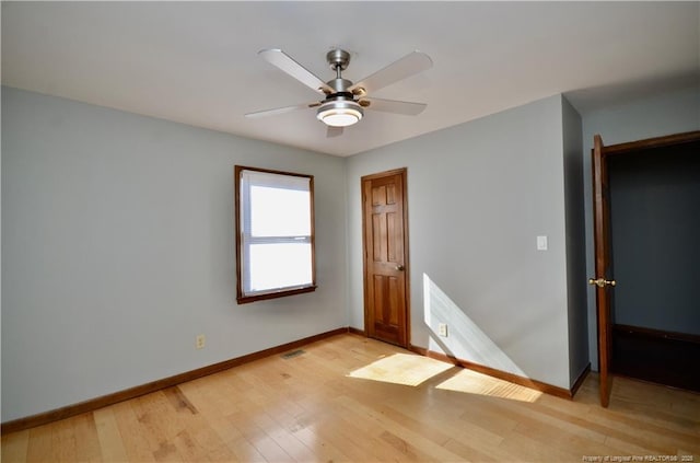 interior space with light hardwood / wood-style flooring and ceiling fan