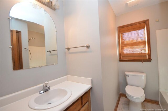 full bathroom featuring vanity, tile patterned floors, toilet, and bathtub / shower combination