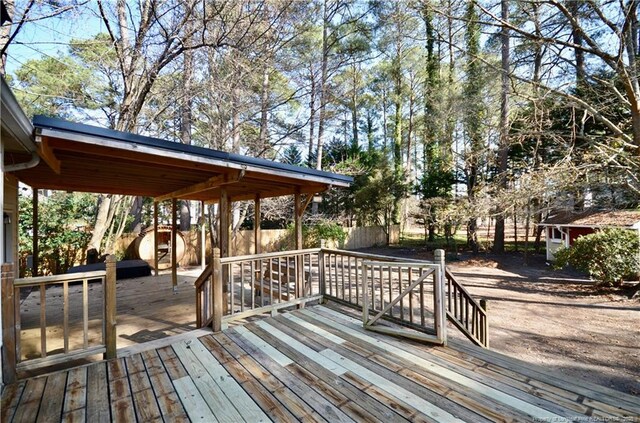 deck featuring a storage unit