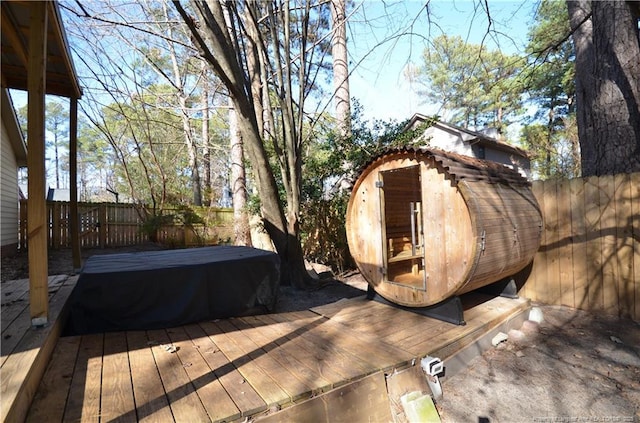 wooden deck with a shed