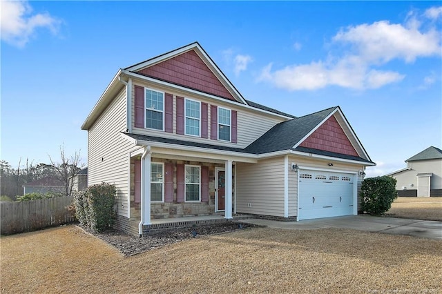 craftsman house featuring a garage and a porch