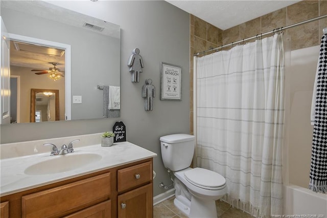 full bathroom featuring ceiling fan, tile patterned flooring, shower / tub combo, vanity, and toilet