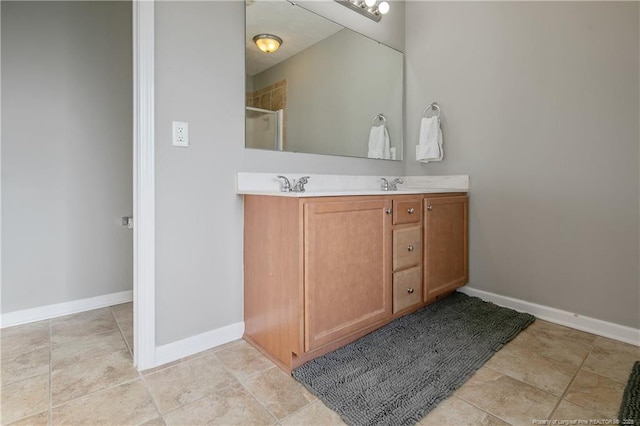 bathroom with vanity and an enclosed shower