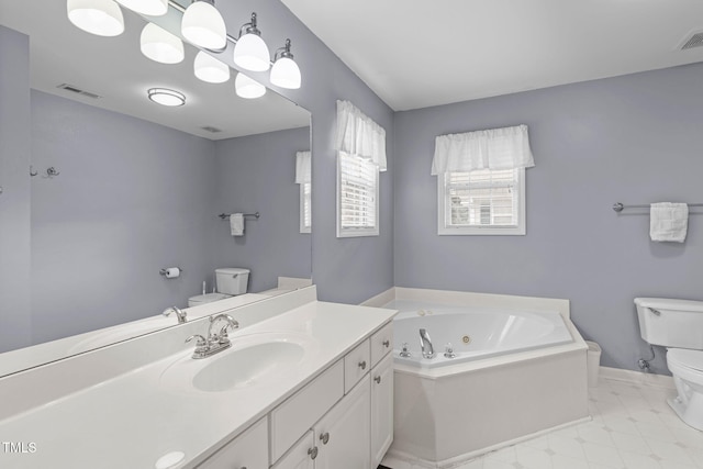 bathroom with a tub to relax in, toilet, and vanity