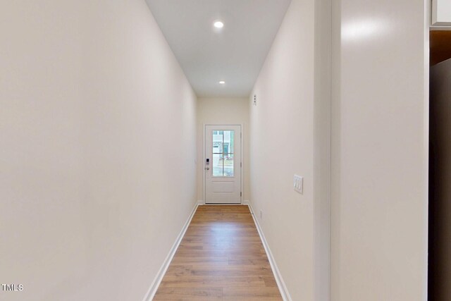7117 Hubner Pl Unit 22, Cary, NC 27519 - corridor with light wood finished floors and recessed lighting