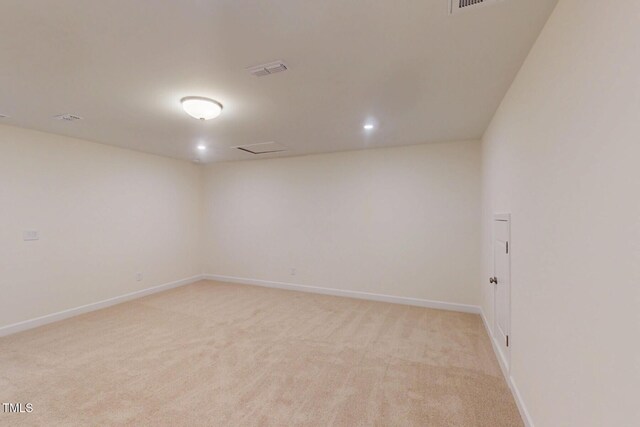 7117 Hubner Pl Unit 22, Cary, NC 27519 - empty room with light colored carpet and recessed lighting