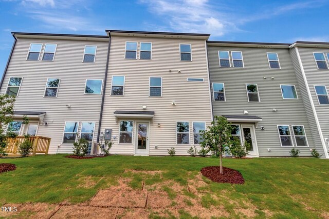 7117 Hubner Pl Unit 22, Cary, NC 27519 - back of property with a lawn