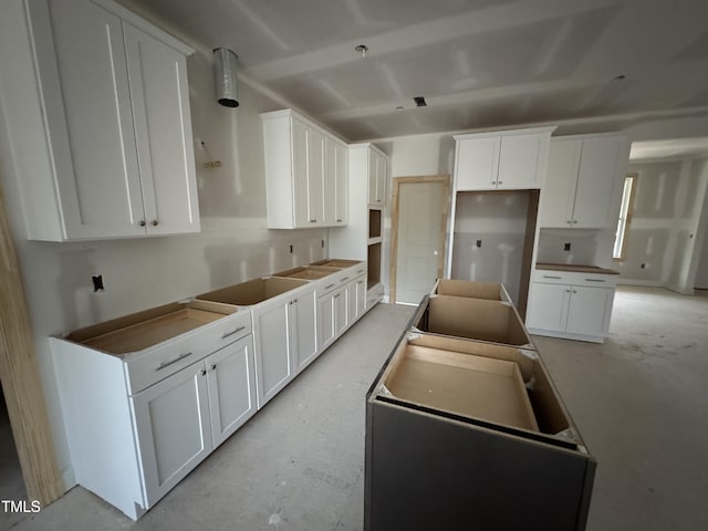 kitchen with white cabinets