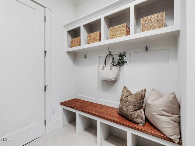 mudroom with light tile patterned floors