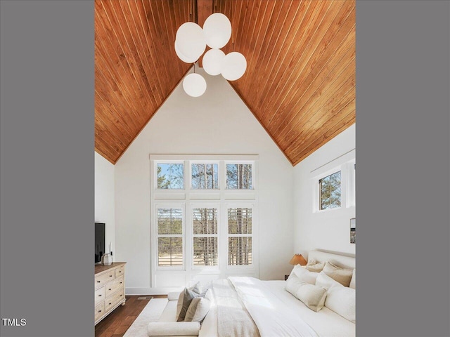 bedroom with high vaulted ceiling, wood ceiling, and dark hardwood / wood-style flooring