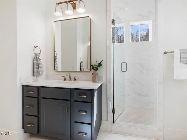 bathroom with vanity and an enclosed shower